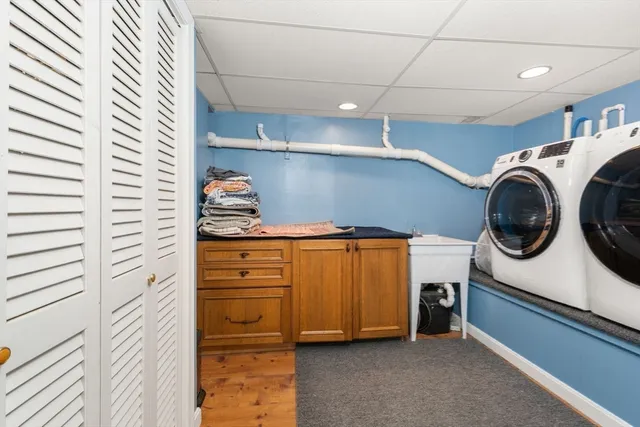 a view of a storage & utility room with washer and dryer