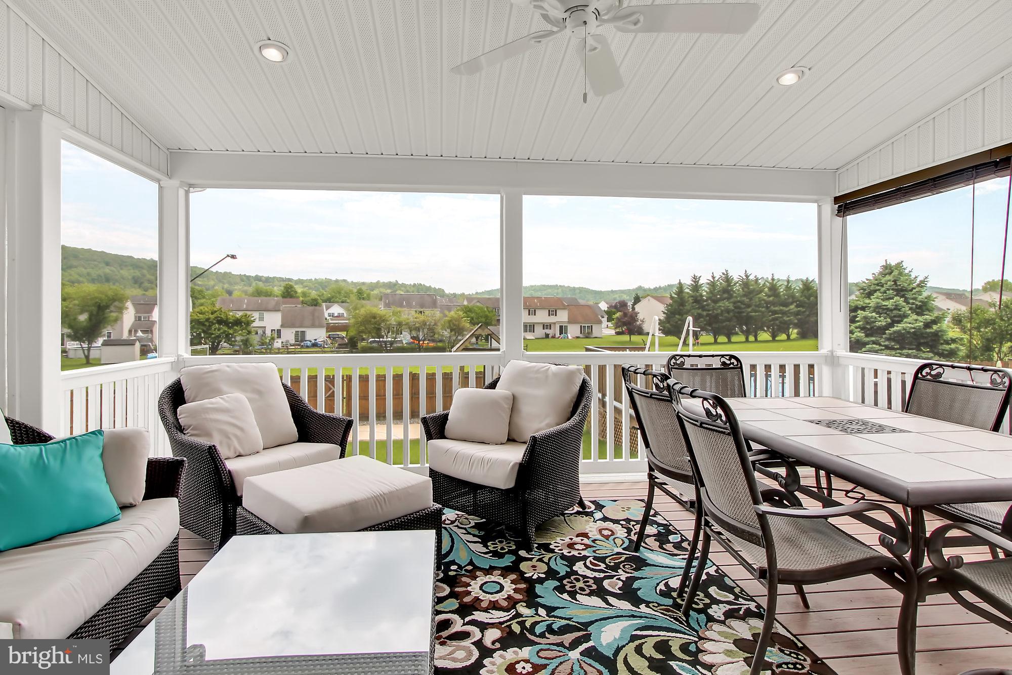 22 Roxberry Drive Reading, PA 19608 - Photo 5 of 36 Huge screened patio seating area with lights & fan