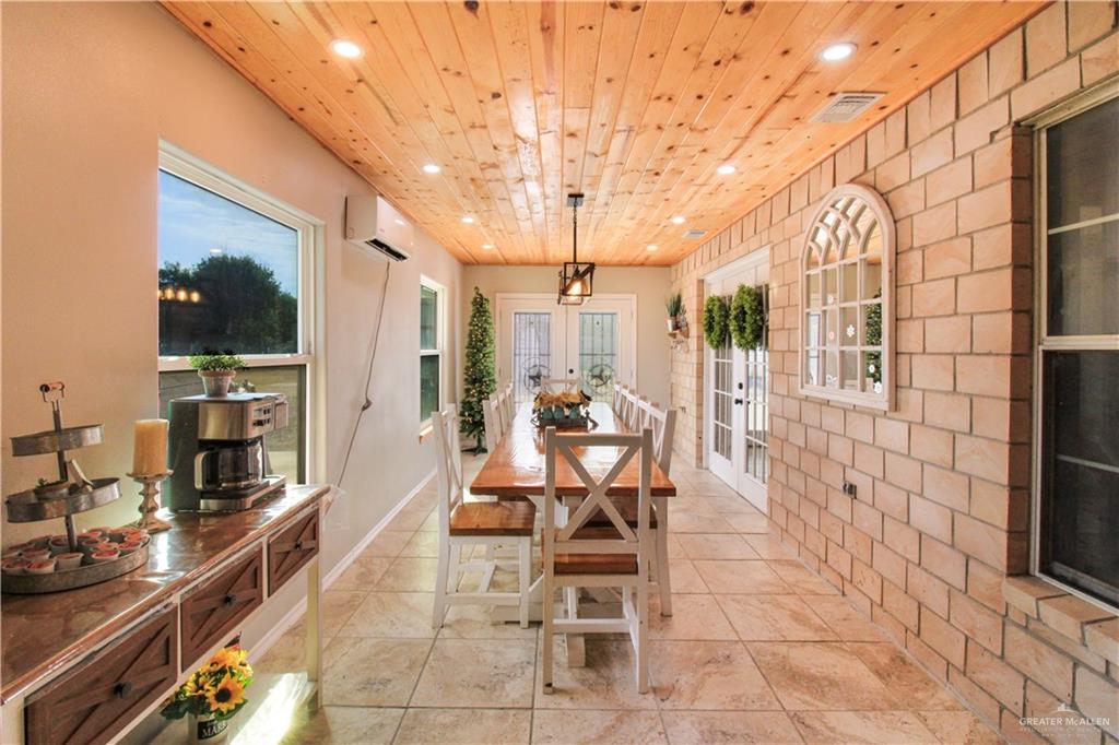 21412 Rusty Lane Harlingen, TX 78552 - Photo 6 of 35 a view of a dining room with furniture and a kitchen