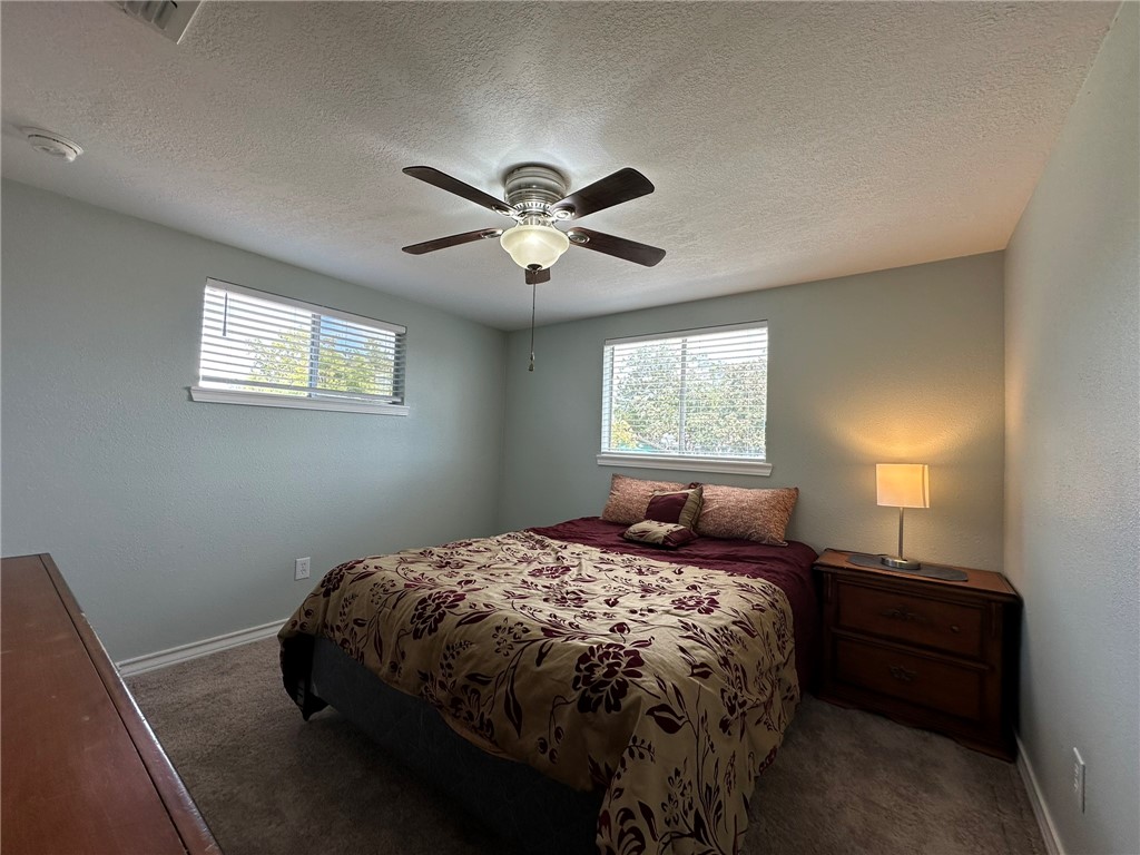 201 Volpe Circle Gregory, TX 78374 - Photo 15 of 29 a bedroom with a bed and a window