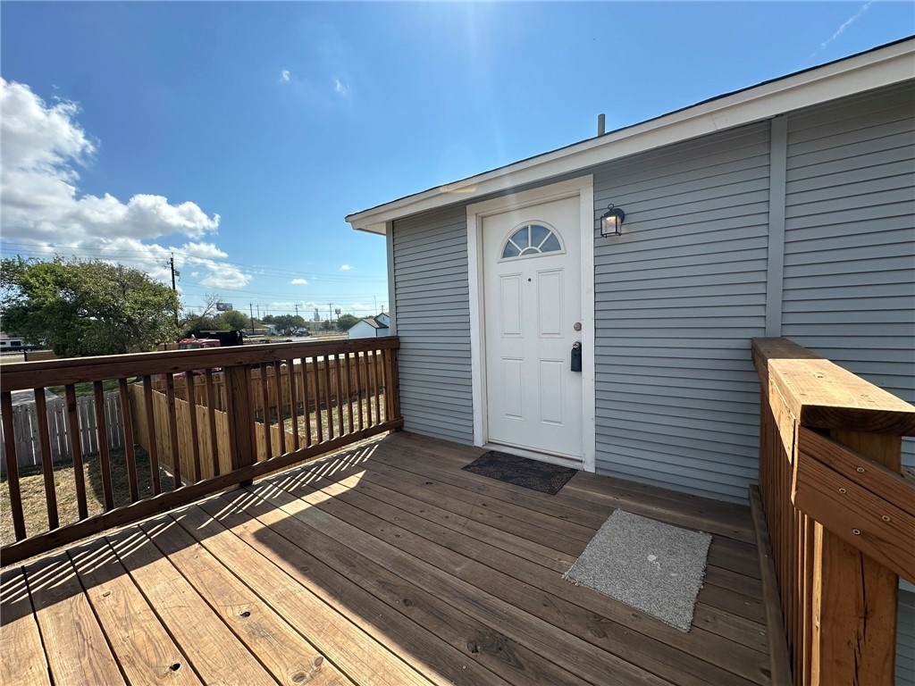 201 Volpe Circle Gregory, TX 78374 - Photo 2 of 29 a view of a wooden deck