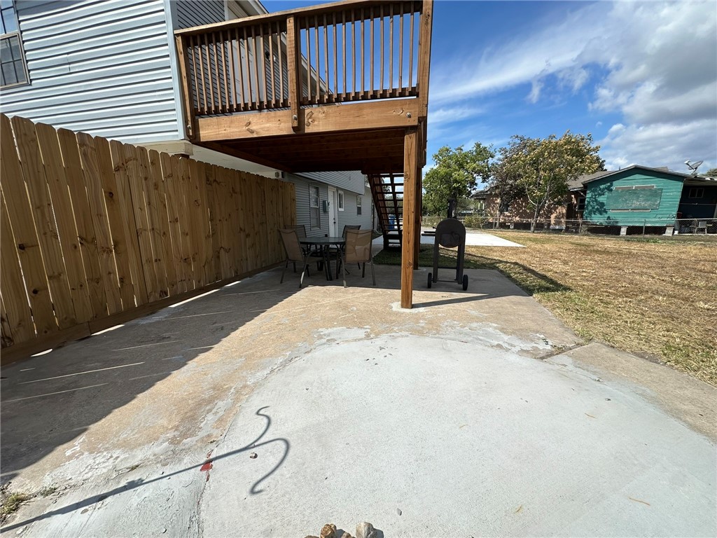 201 Volpe Circle Gregory, TX 78374 - Photo 26 of 29 a view of a patio with a table and chairs