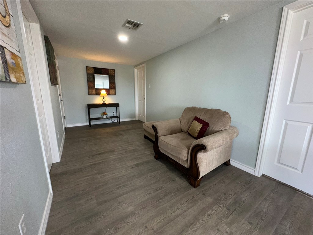 201 Volpe Circle Gregory, TX 78374 - Photo 7 of 29 a living room with furniture and a wooden floor