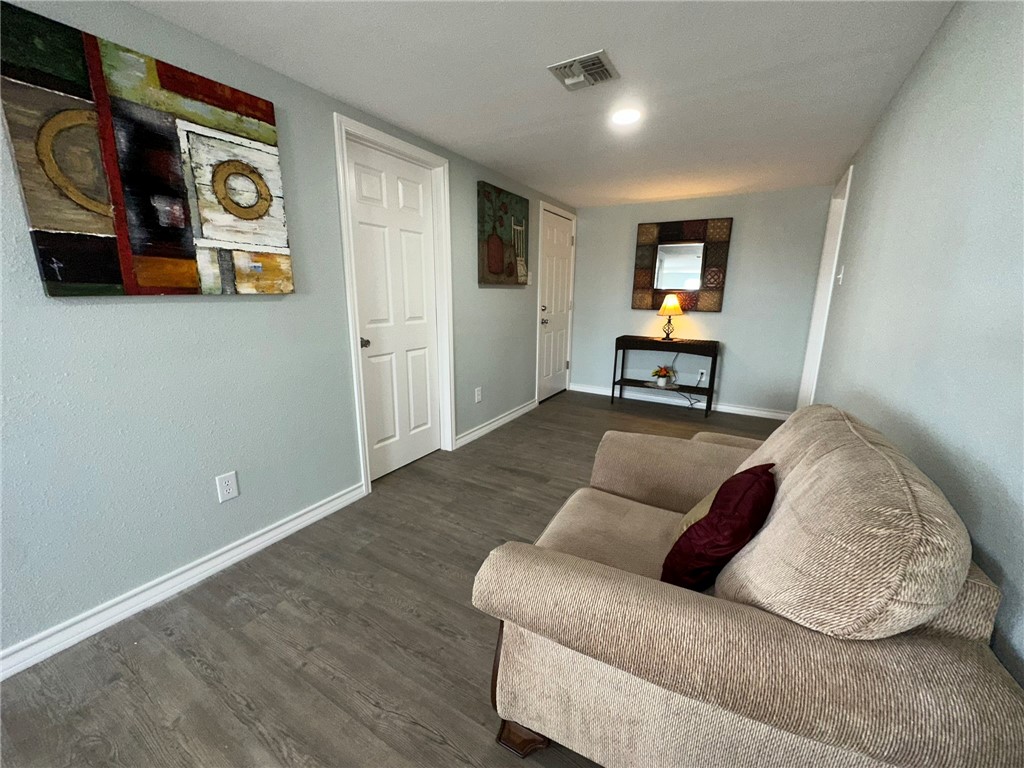 201 Volpe Circle Gregory, TX 78374 - Photo 8 of 29 a living room with furniture and a wooden floor