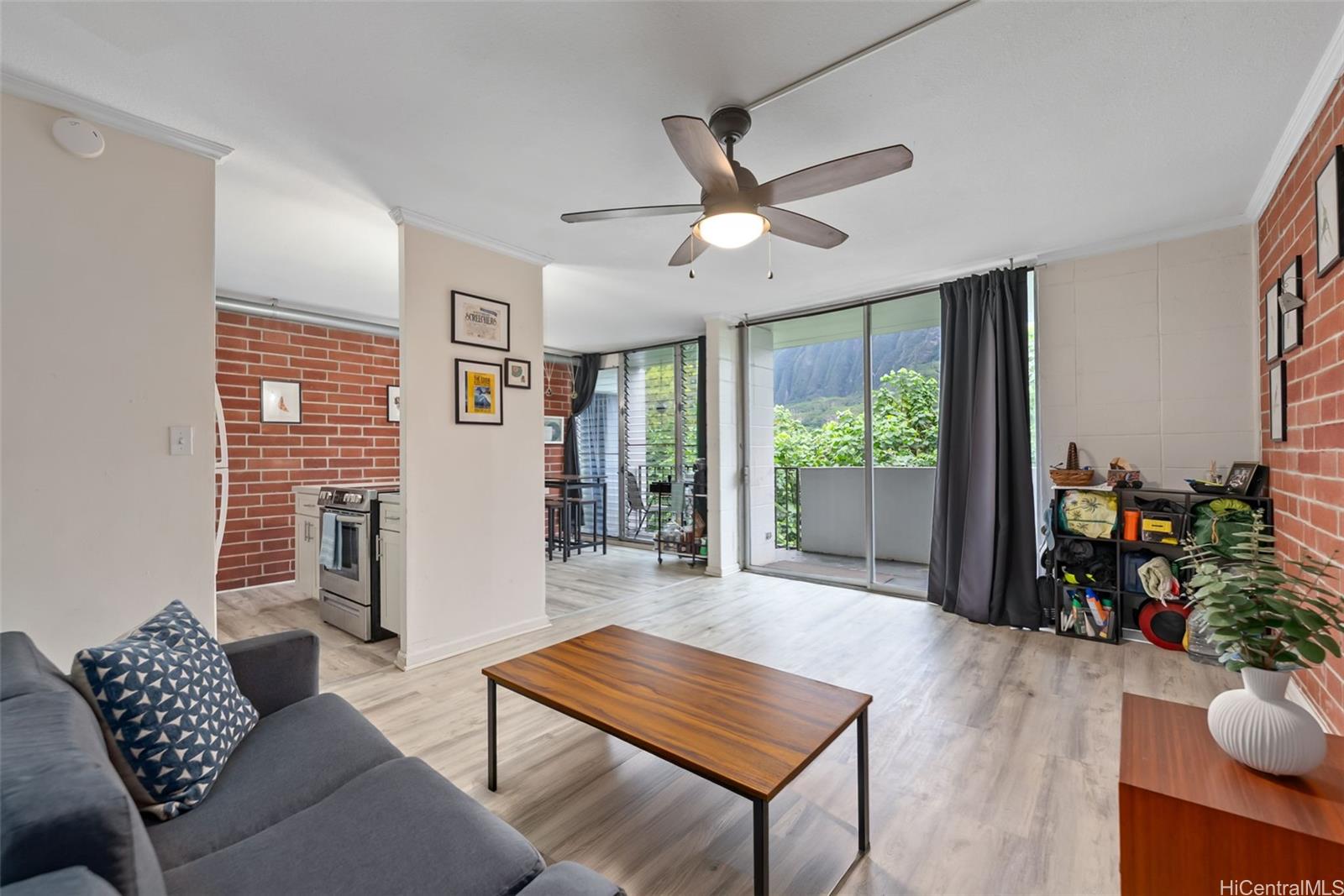 45-535 Luluku Road, Unit G3 Kaneohe, HI 96744 - Photo 1 of 25 a living room with furniture and a window