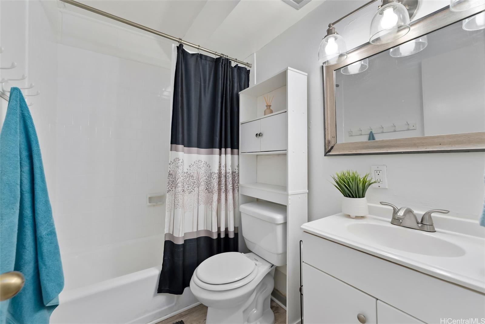 45-535 Luluku Road, Unit G3 Kaneohe, HI 96744 - Photo 19 of 25 a bathroom with a sink toilet and shower