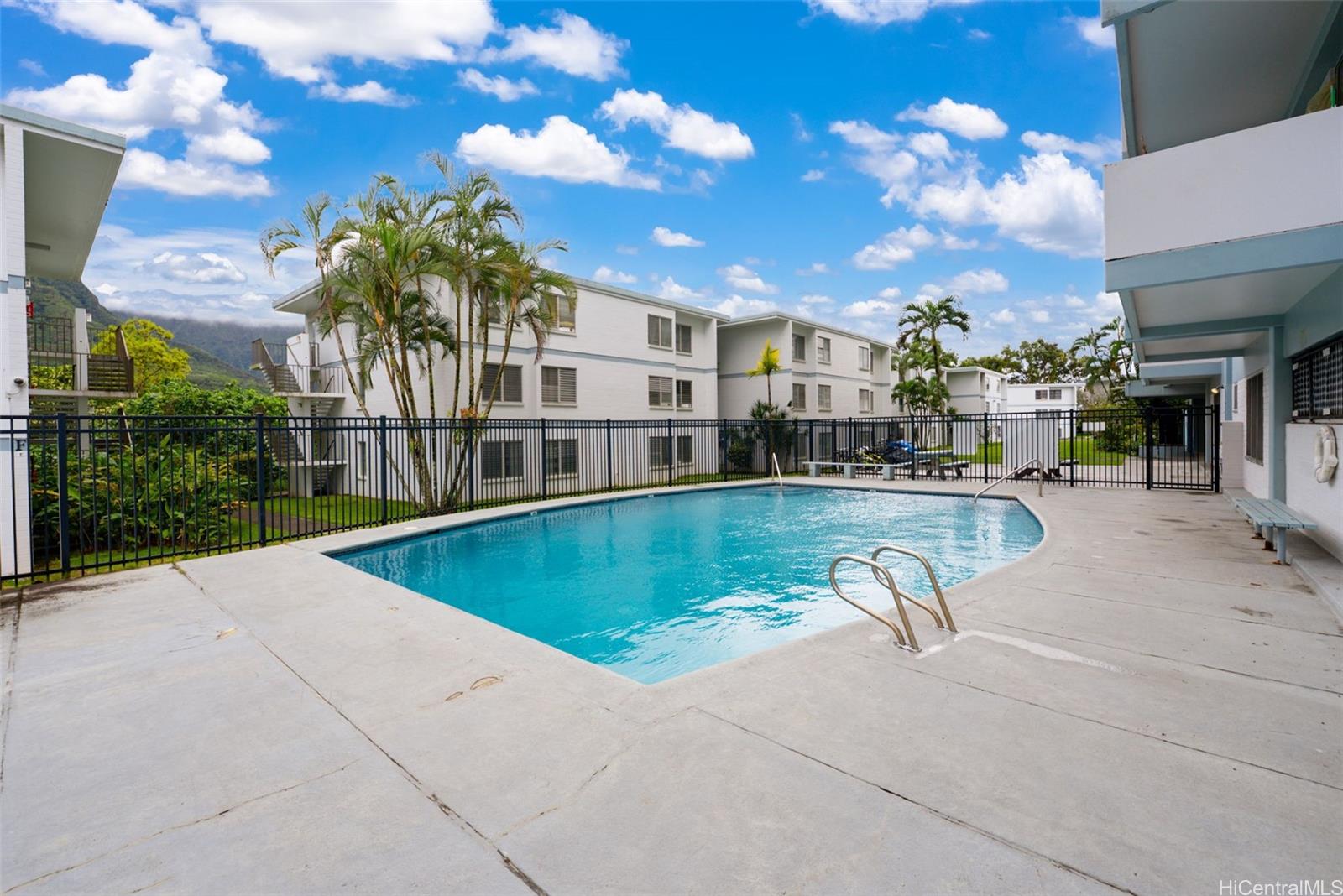 45-535 Luluku Road, Unit G3 Kaneohe, HI 96744 - Photo 22 of 25 a view of a swimming pool with a patio