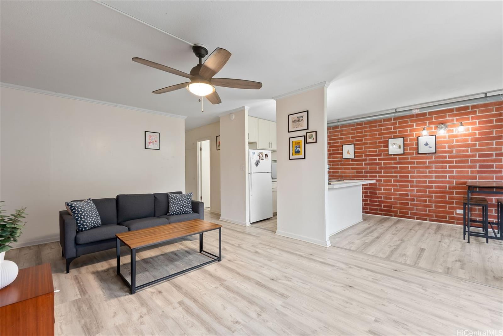 45-535 Luluku Road, Unit G3 Kaneohe, HI 96744 - Photo 5 of 25 a living room with furniture and a table
