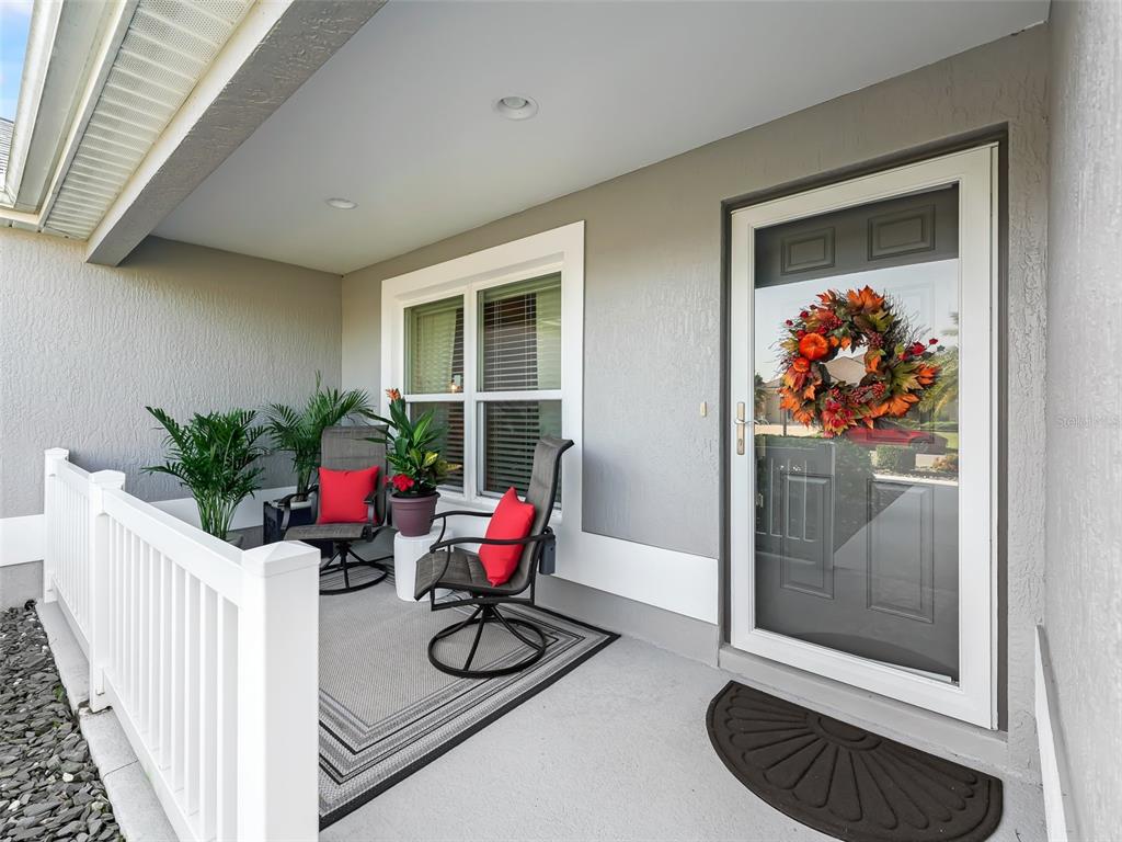 3812 Nottingham Loop The Villages, FL 32163 - Photo 5 of 30 a dining room with furniture and wooden floor