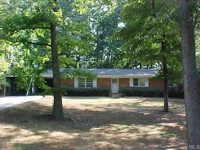6620 Johnsdale Road Raleigh, NC 27615 - Photo 1 of 1 a front view of a house with yard and tree