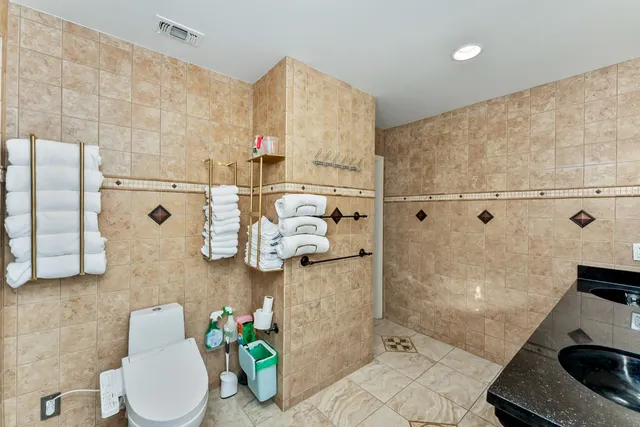 a bathroom with a sink and mirror