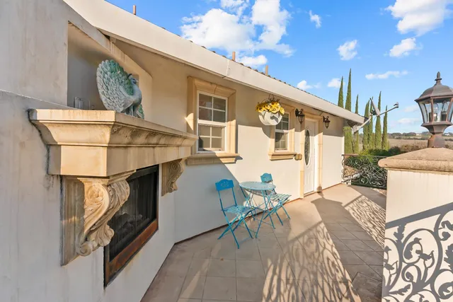 a view of living room kitchen and entryway