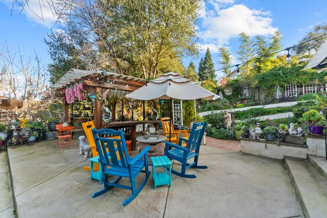 a view of street with sitting area