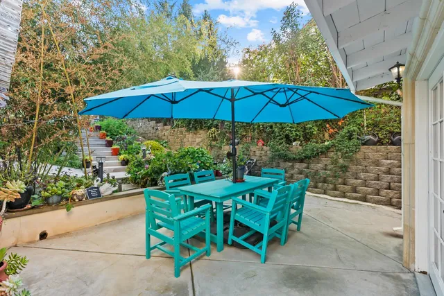 a view of an outdoor sitting area with golf course