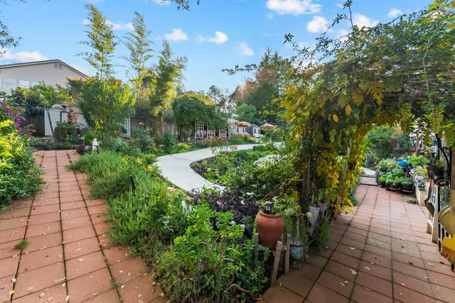 a view of a house with a garden