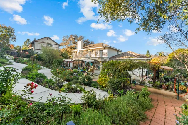 a garden view with a seating space