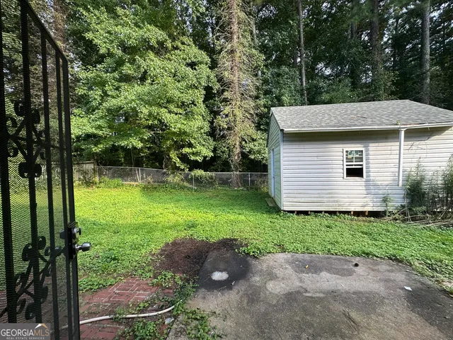 a view of a backyard with a garden