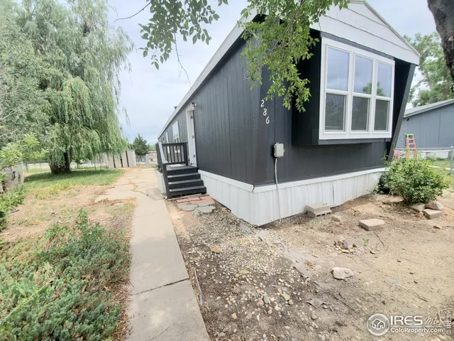 a view of entrance gate of a house