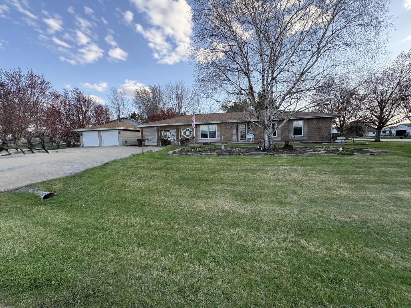 5212 South Mill Pond Road Rochelle, IL 61068 - Photo 3 of 66 a view of a house with a yard