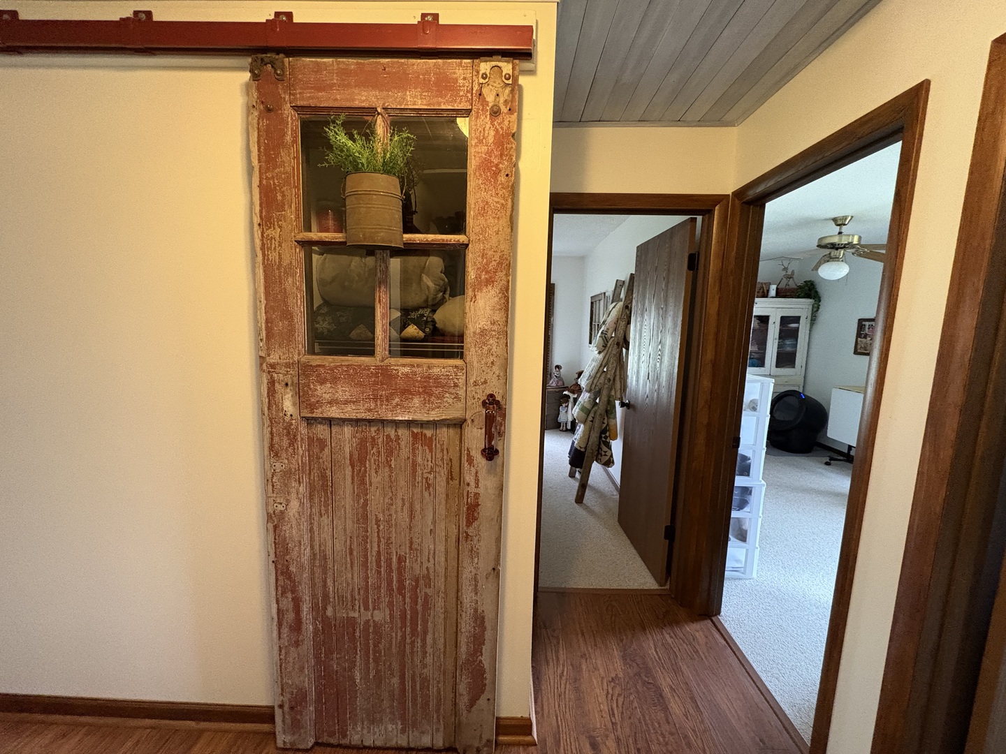 5212 South Mill Pond Road Rochelle, IL 61068 - Photo 31 of 66 a view of a hallway with wooden floor and closet