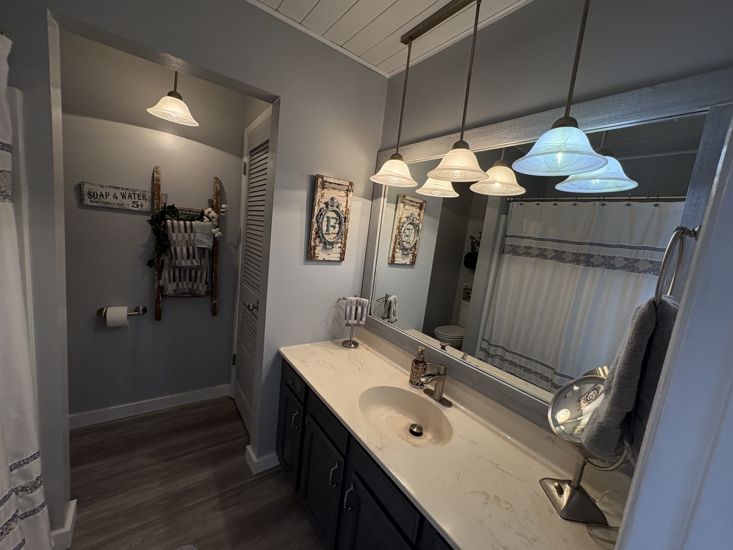5212 South Mill Pond Road Rochelle, IL 61068 - Photo 36 of 66 a bathroom with a sink vanity and mirror