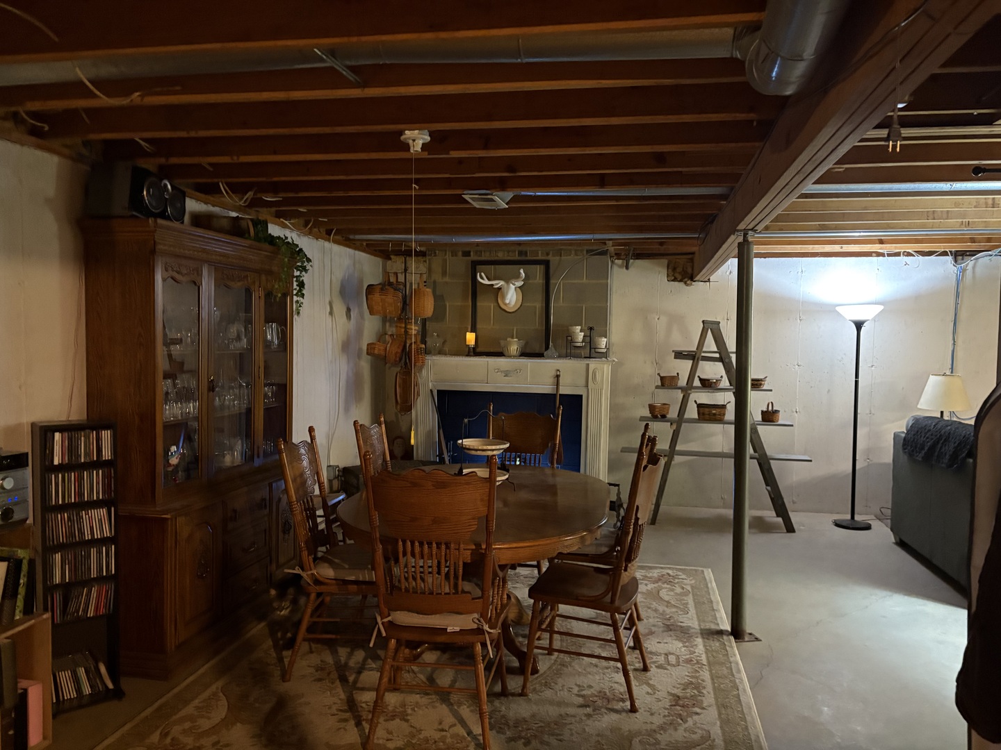 5212 South Mill Pond Road Rochelle, IL 61068 - Photo 46 of 66 a dining room with furniture and a chandelier
