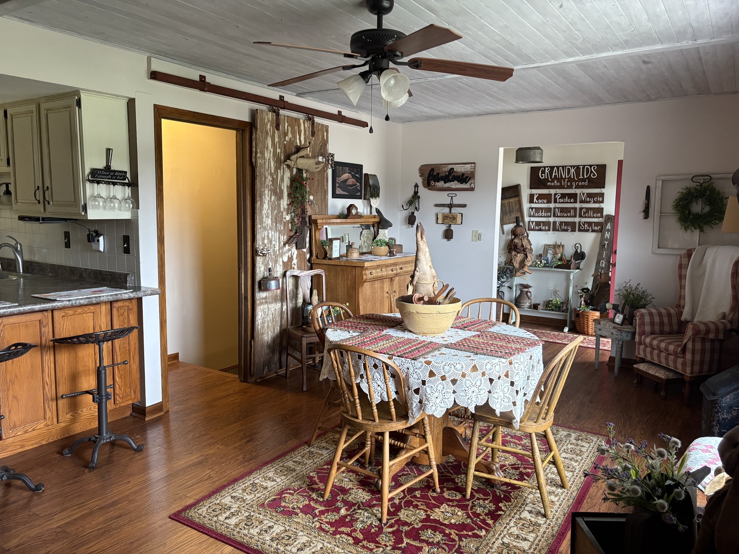 5212 South Mill Pond Road Rochelle, IL 61068 - Photo 8 of 66 a view of a dining room with furniture window and wooden floor
