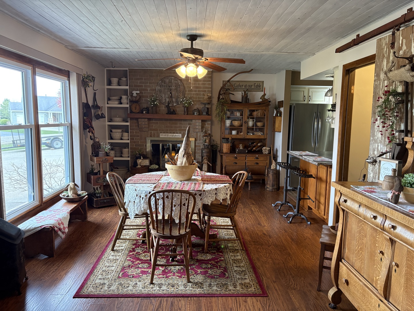 5212 South Mill Pond Road Rochelle, IL 61068 - Photo 9 of 66 a view of a dining room with furniture window and wooden floor