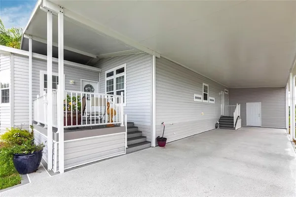 a view of a porch with a bench
