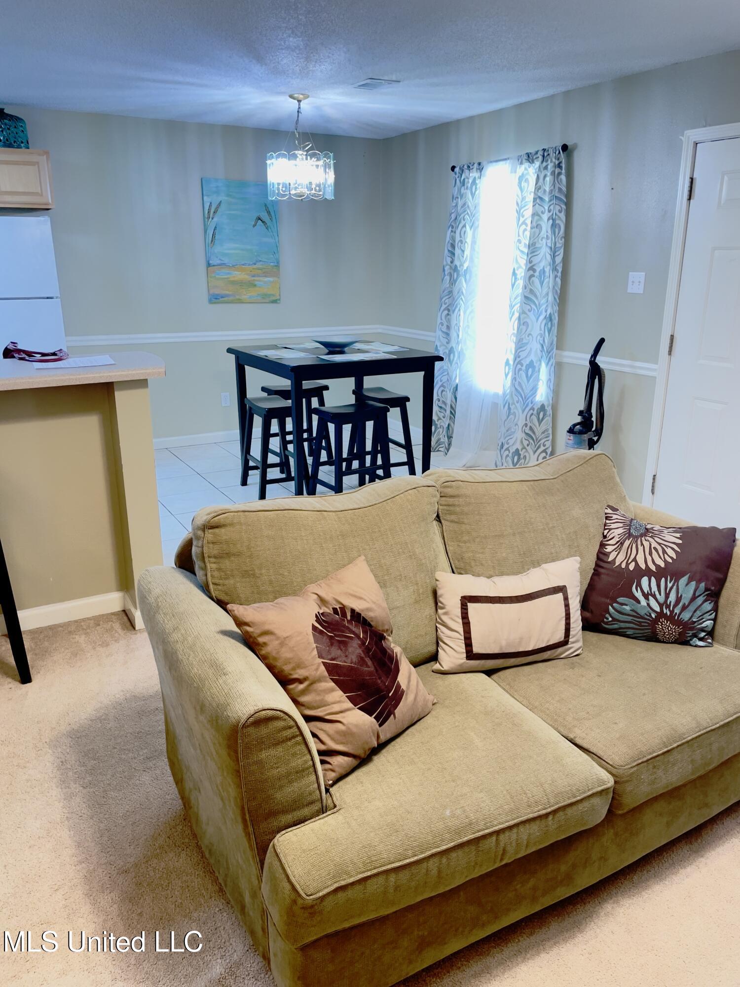 5080 Gautier Vancleave Road, Unit E3 Gautier, MS 39553 - Photo 6 of 32 IMG_0476