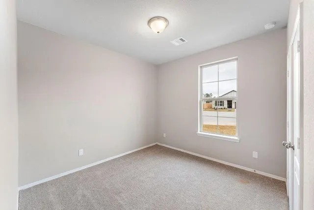 an empty room with a window