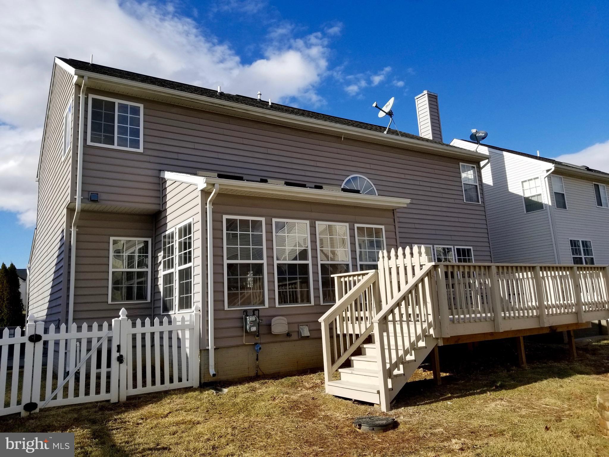 54 Watercourse Drive Ranson, WV 25438 - Photo 3 of 30 a front view of a house with a balcony