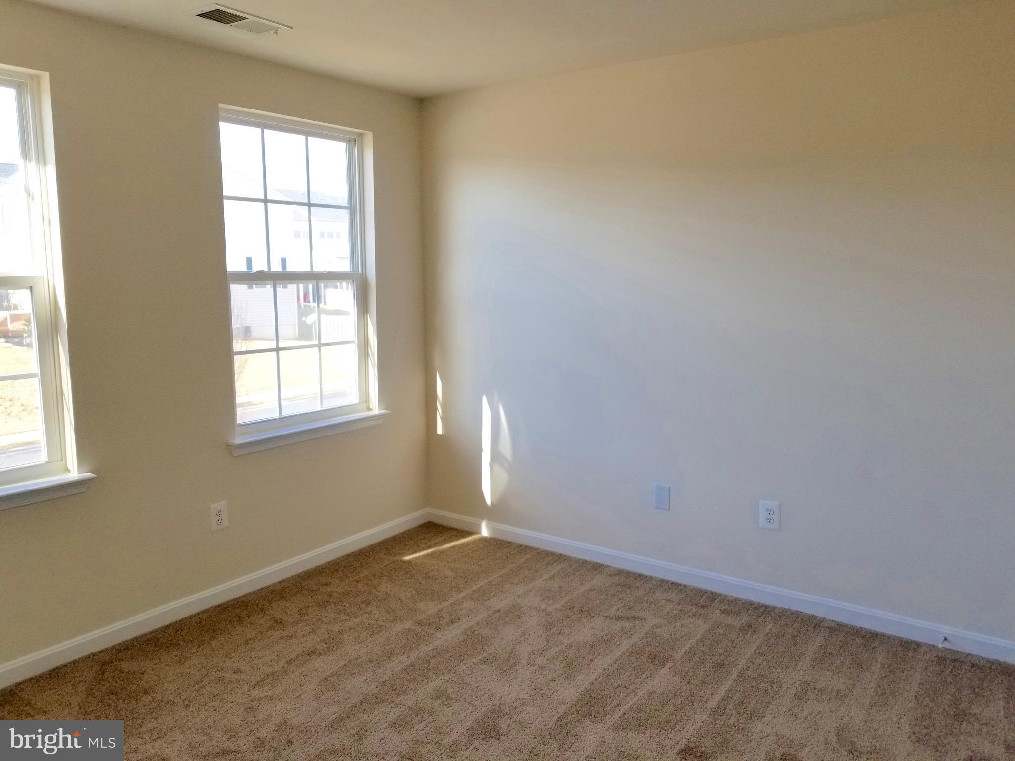 54 Watercourse Drive Ranson, WV 25438 - Photo 22 of 30 an empty room with a window