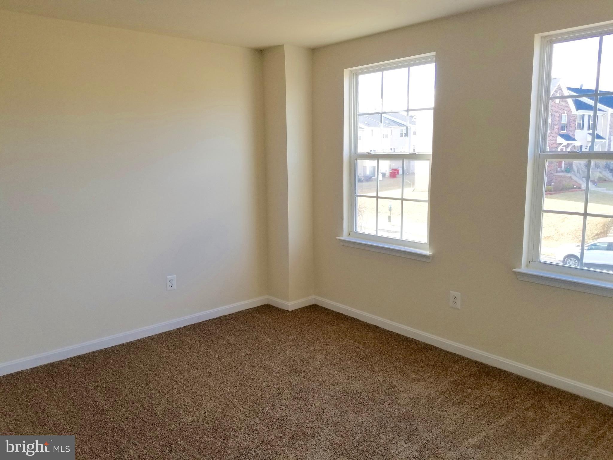 54 Watercourse Drive Ranson, WV 25438 - Photo 24 of 30 an empty room with windows
