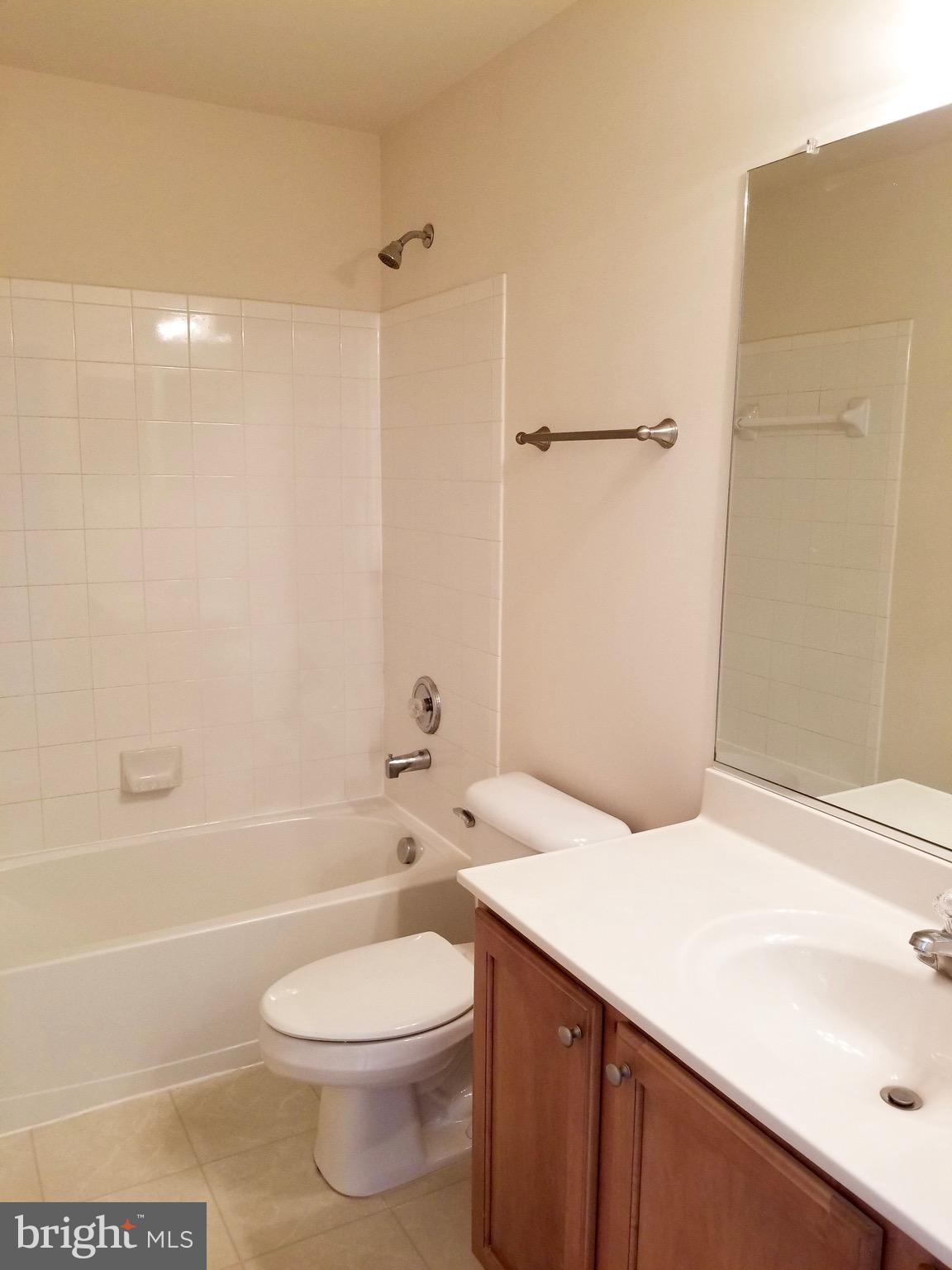 54 Watercourse Drive Ranson, WV 25438 - Photo 26 of 30 a bathroom with a sink a toilet and shower