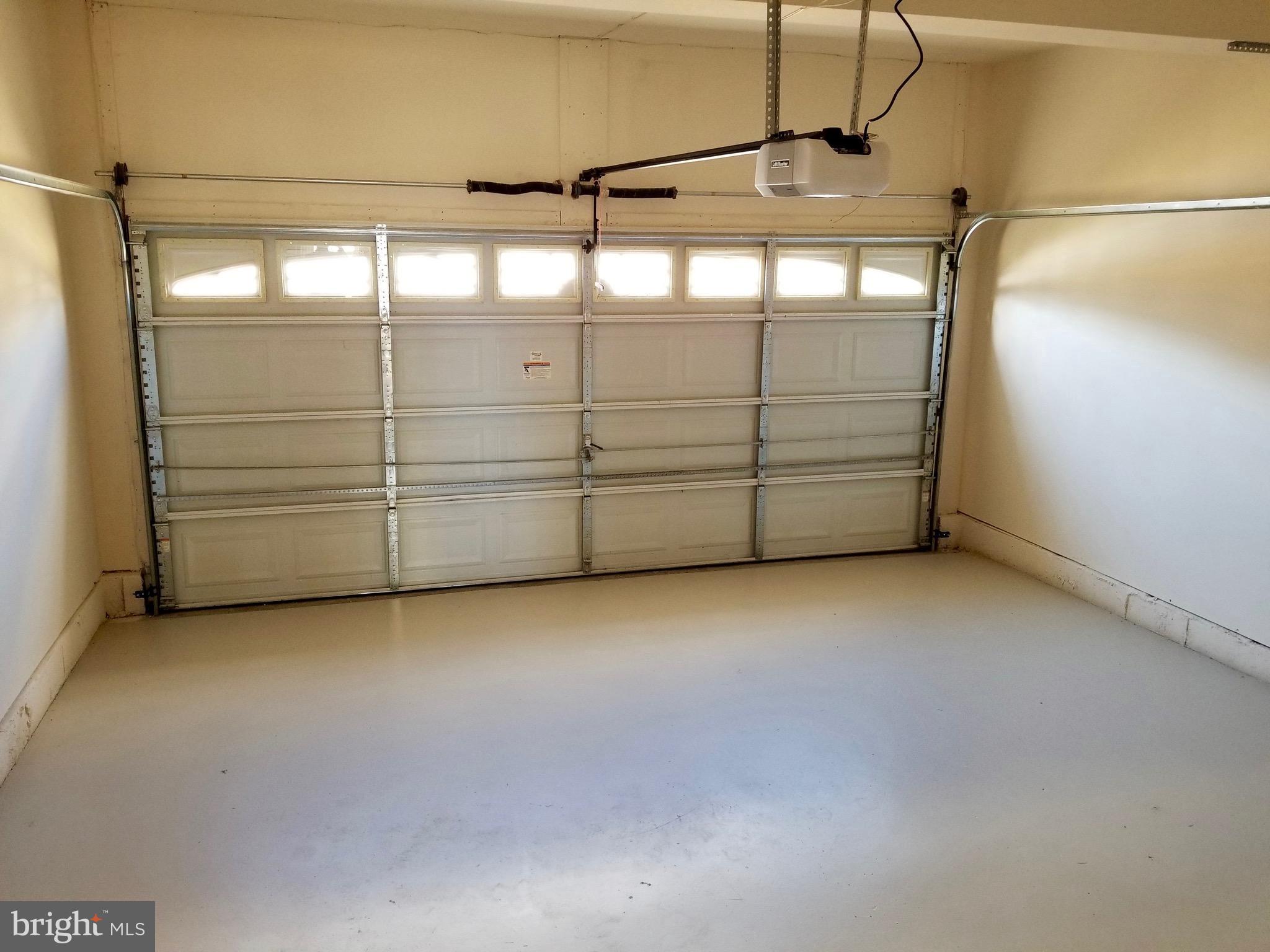 54 Watercourse Drive Ranson, WV 25438 - Photo 30 of 30 a view of a room with racks on the wall