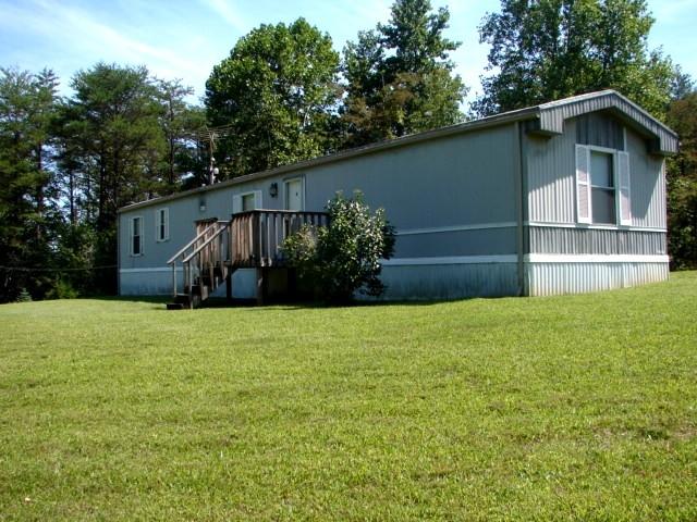 1020 Dryhill Road Ferrum, VA 24088 - Photo 2 of 9 a house with a tree in front of it