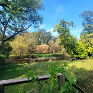 a view of a lake with a yard