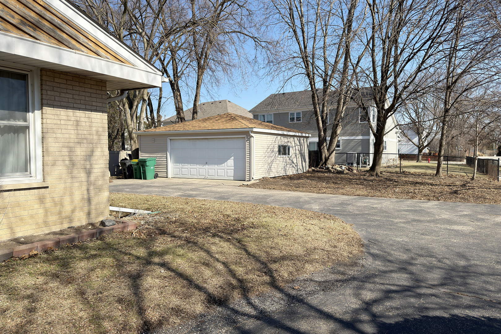 62 Mayer Avenue Wheeling, IL 60090 - Photo 20 of 20 a front view of a house with a yard