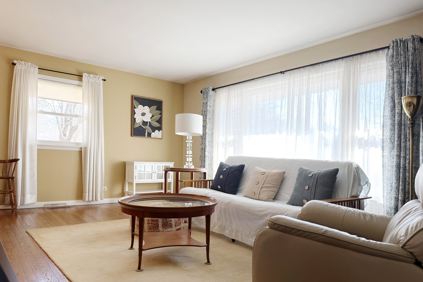 62 Mayer Avenue Wheeling, IL 60090 - Photo 2 of 20 a living room with furniture and a window
