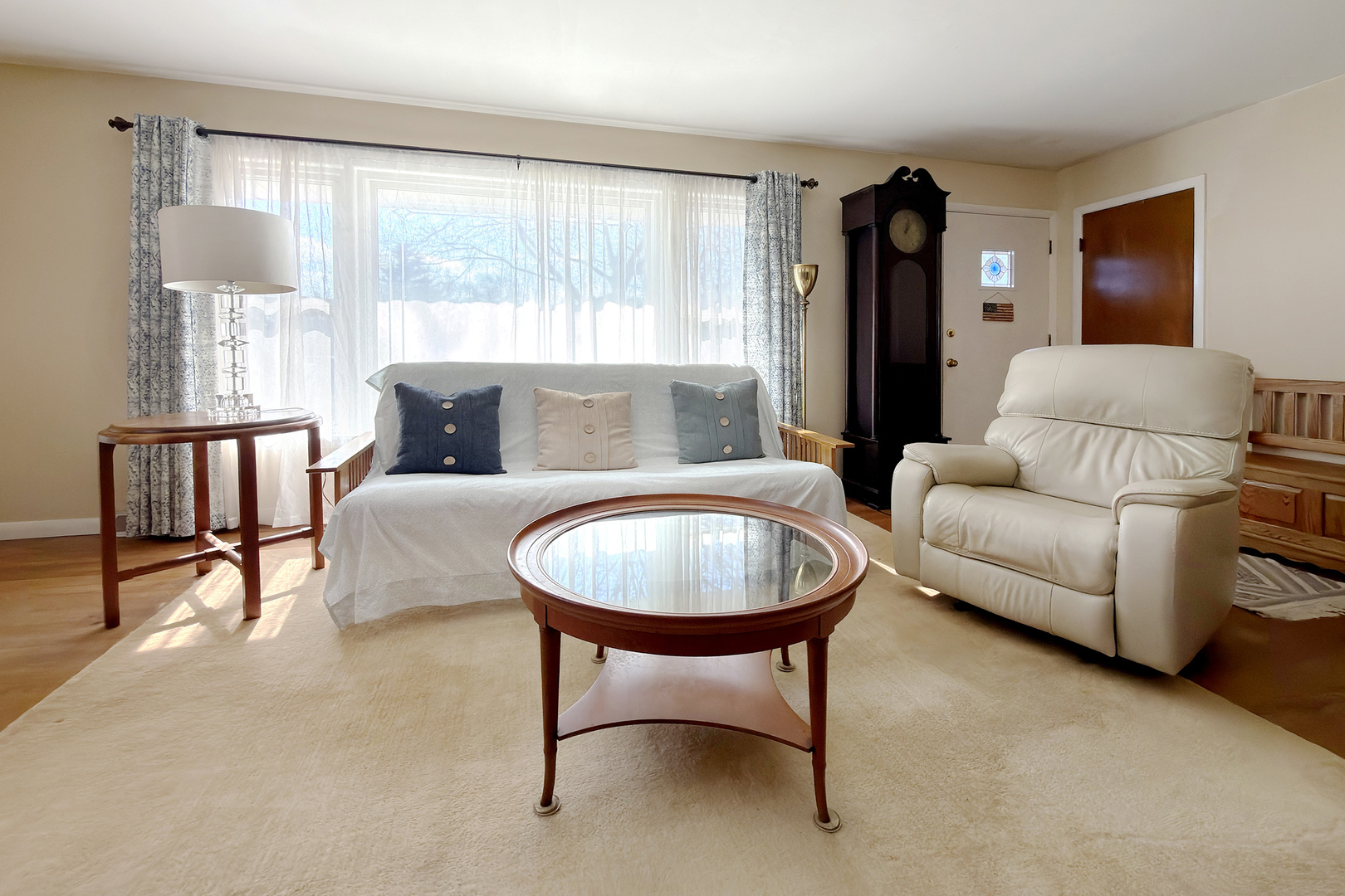 62 Mayer Avenue Wheeling, IL 60090 - Photo 4 of 20 a living room with furniture and a large window