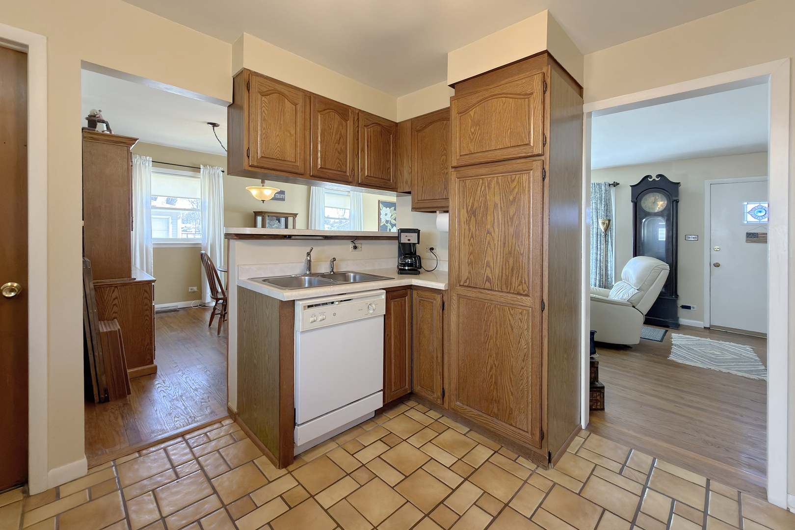 62 Mayer Avenue Wheeling, IL 60090 - Photo 7 of 20 a kitchen with stainless steel appliances granite countertop a refrigerator and a stove