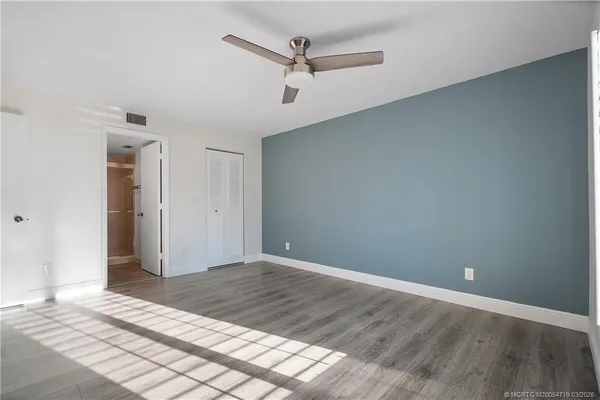 a view of a livingroom with a ceiling fan
