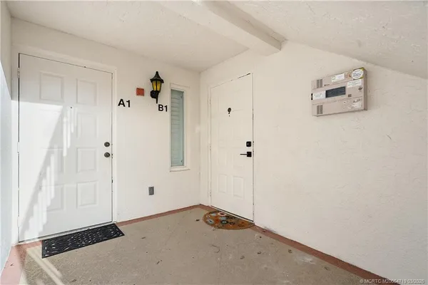 a view of a bathroom with an empty space