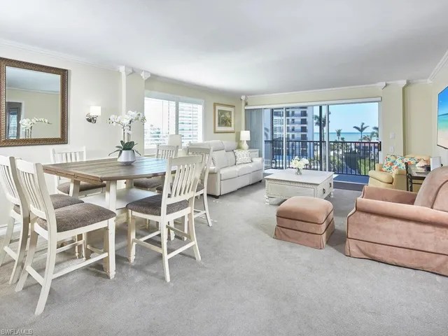 a view of a balcony with chairs