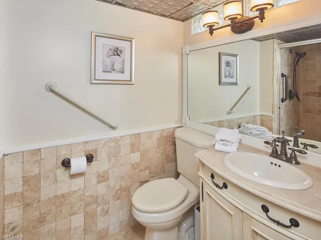 a view of a swimming pool and a yard