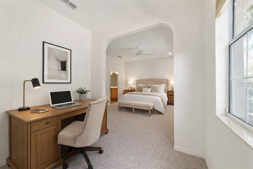 8434 Southwest 82nd Loop Ocala, FL 34481 - Photo 24 of 41 a bedroom with a bed and a window