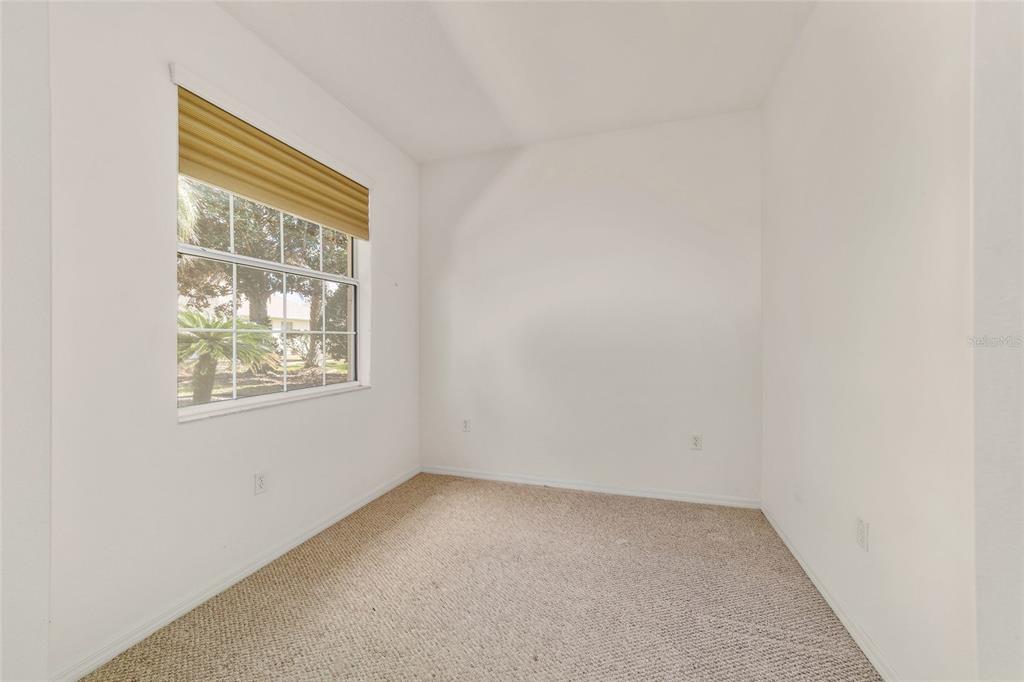 8434 Southwest 82nd Loop Ocala, FL 34481 - Photo 25 of 41 an empty room with windows