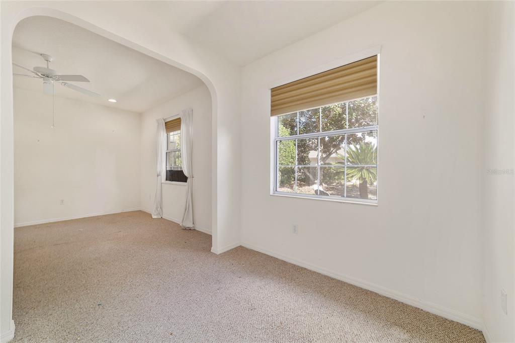 8434 Southwest 82nd Loop Ocala, FL 34481 - Photo 26 of 41 an empty room with windows