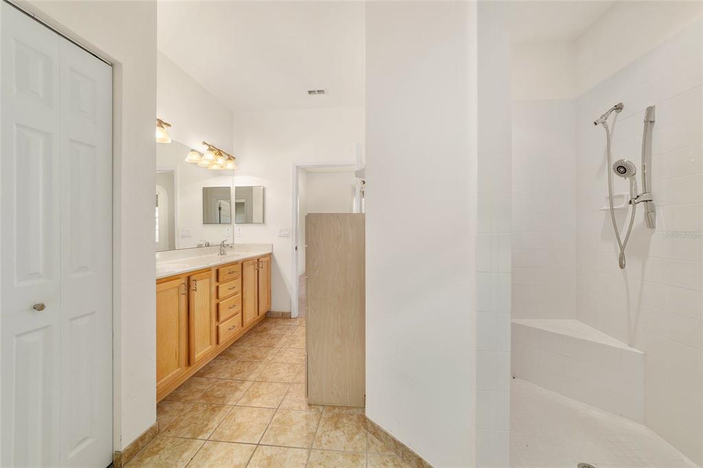 8434 Southwest 82nd Loop Ocala, FL 34481 - Photo 28 of 41 a spacious bathroom with a shower and a sink